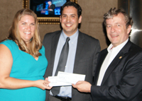 RNASA President Rodolfo González and RNASA Treasurer Geoff Atwater present donation to Texas Aerospace Scholars program.