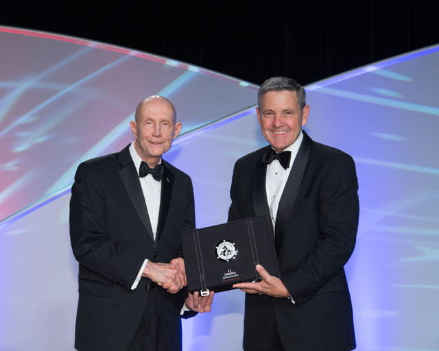 General Thomas P. Stafford presents the OMEGA watch to Colonel Robert Cabana