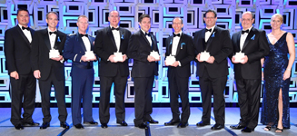 Team Stellar Awardees. L to R: Kjell Lindgren (presenting), Steven Van Keuren (ISS Oxygen Generator Assembly Recovery Team), Brian Vesey (GPS IIF Team), Robert Rossato (EVA 35 Recovery Team), Jon Edwards (Falcon 9 Team), Marc Rayman (Dawn Flight Team), Steve Hobart (New Shepard Team), Keith Davies (Next Generation Cygnus Design Team), Kate Rubins (presenting)