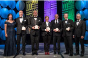 Stellar Award Winners  Mid Career -
L to R: Dr. Shannon Walker (presenting), Timothy J. Lindsey, Dr. Edward B. Bierhaus, Laura A. Shaw, Timothy P. Pepe, Matthew T. Jakubek, Mark Vande Hei (presenting). Not pictured: Marc A. Gibson.